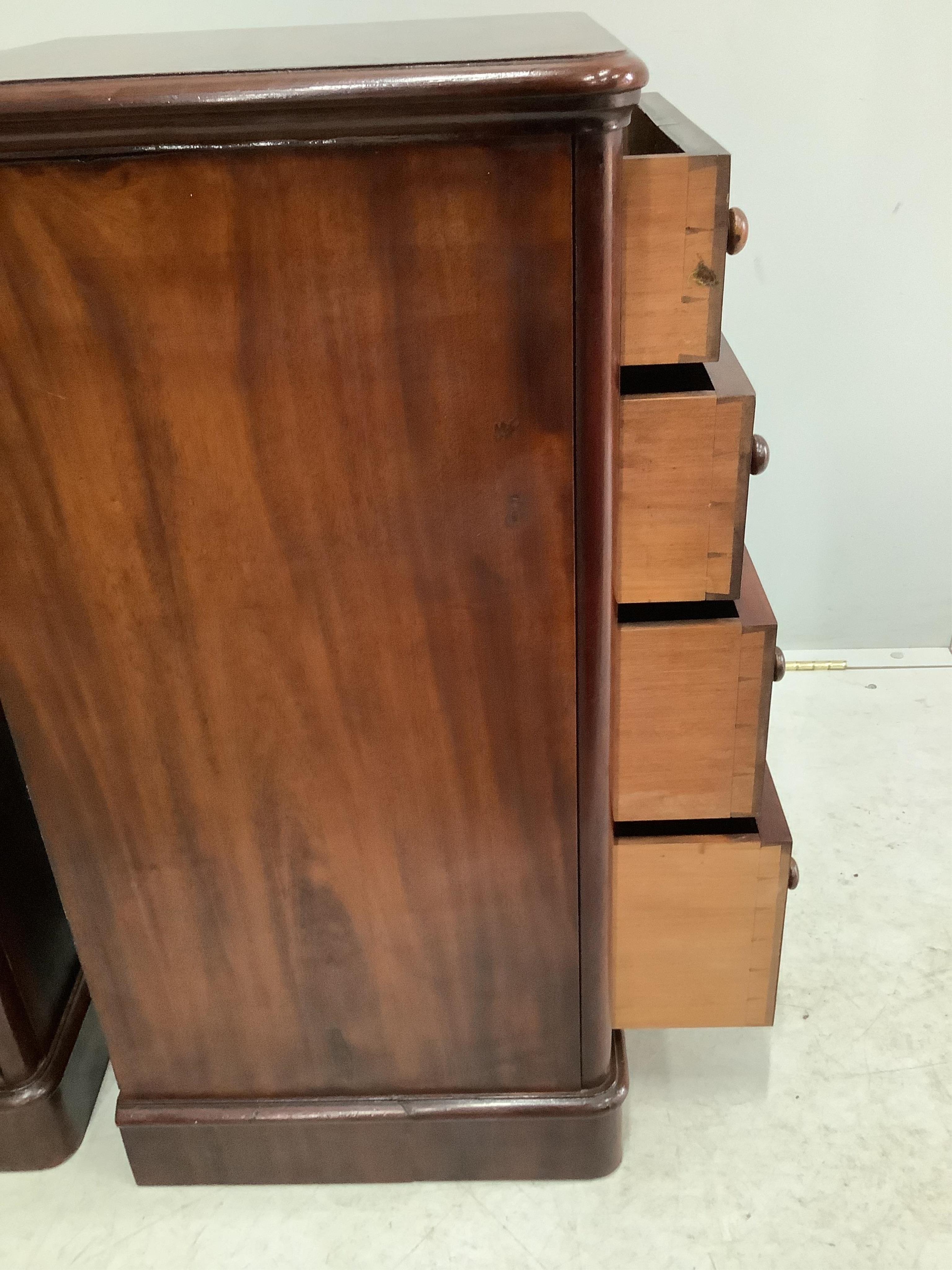 A pair of Victorian and later mahogany four drawer bedside chests, adapted, width 42cm, depth 40cm, height 81cm. Condition - good.